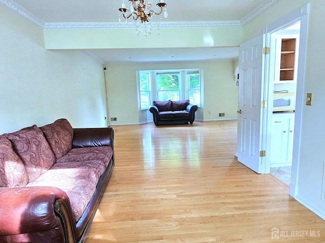 53 Perilli Dr, Hamilton, NJ 08610 - living area featuring ornamental molding, a chandelier, and light wood finished floors