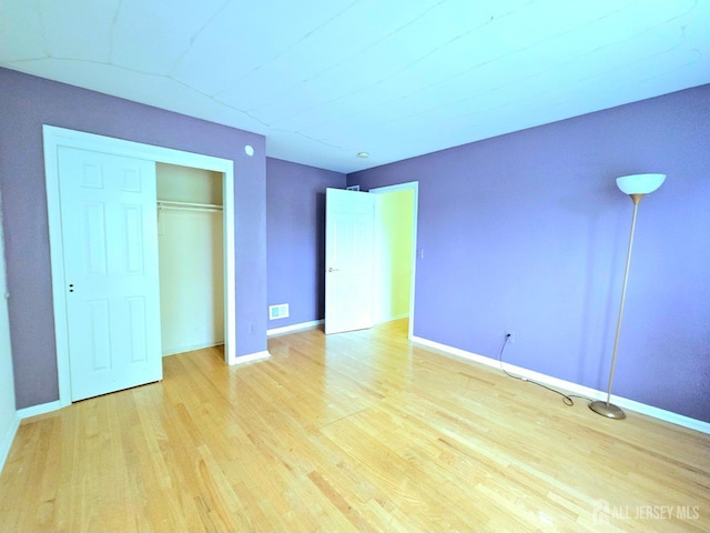 53 Perilli Dr, Hamilton, NJ 08610 - unfurnished bedroom with wood finished floors, baseboards, and a closet