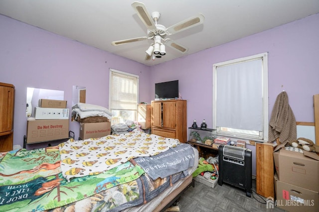 bedroom featuring ceiling fan