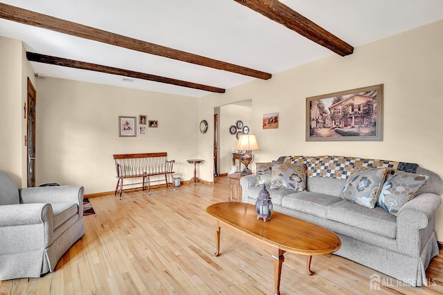 700 Sunbrite Ln, Piscataway, NJ 08854 - living room with beam ceiling and light wood-style flooring