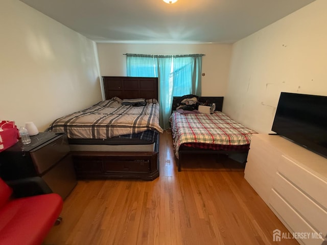 bedroom featuring light hardwood / wood-style floors