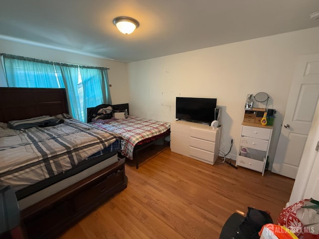 bedroom featuring light hardwood / wood-style flooring