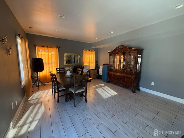 dining area with light wood-type flooring