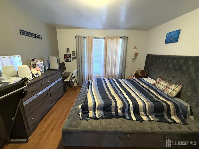 bedroom featuring light hardwood / wood-style flooring