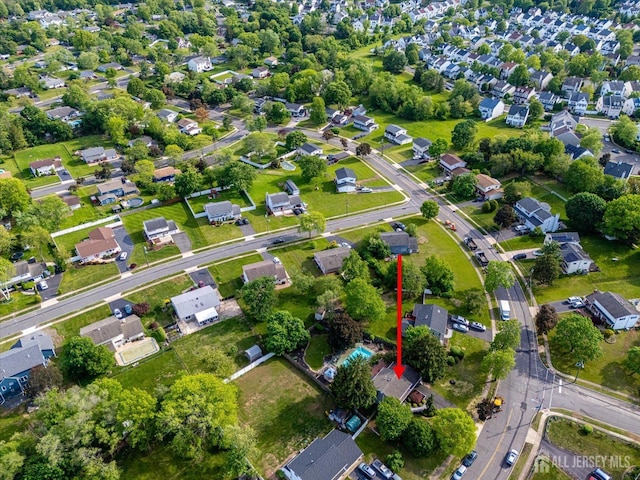 aerial overview of property's location featuring nearby suburban area