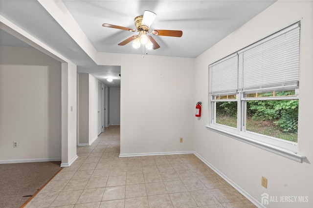 31 Hanover Sq, Middlesex, NJ 08846 - empty room with a ceiling fan and light tile patterned floors