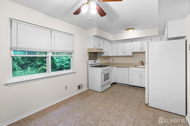 31 Hanover Sq, Middlesex, NJ 08846 - kitchen with white appliances, under cabinet range hood, a ceiling fan, and white cabinetry