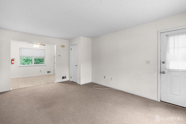 31 Hanover Sq, Middlesex, NJ 08846 - carpeted spare room with baseboards and a ceiling fan