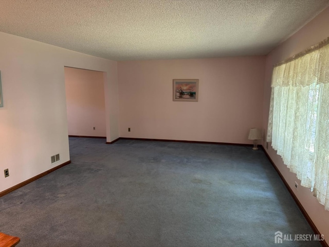 32 Gere Pl, Fanwood, NJ 07023 - carpeted empty room featuring a textured ceiling and baseboards