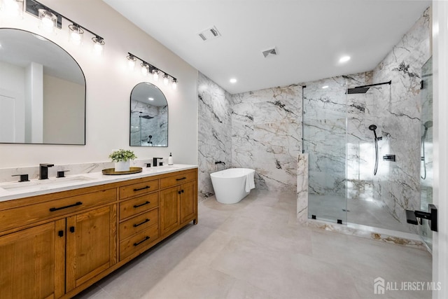 2 Beech Ln, Edison, NJ 08820 - full bath featuring a marble finish shower, a soaking tub, double vanity, tile walls, and recessed lighting