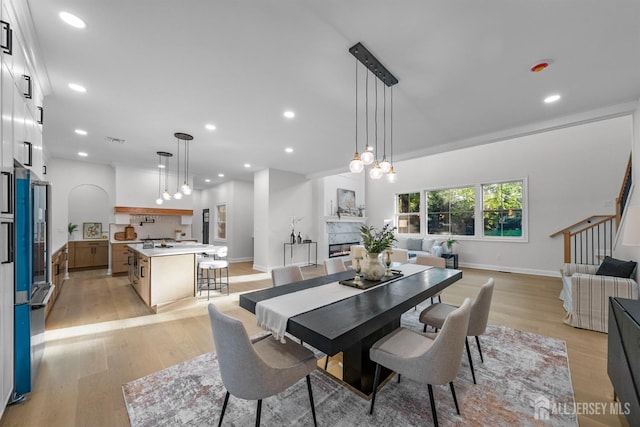 2 Beech Ln, Edison, NJ 08820 - dining room with light wood-style flooring, recessed lighting, baseboards, and stairway