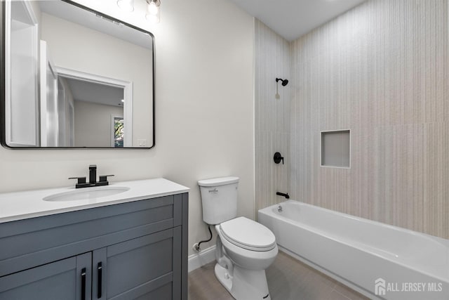 2 Beech Ln, Edison, NJ 08820 - bathroom with toilet, vanity, shower / washtub combination, and baseboards