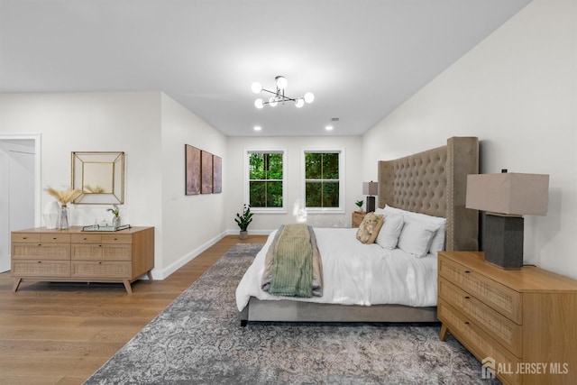 2 Beech Ln, Edison, NJ 08820 - bedroom with wood finished floors, a chandelier, baseboards, and recessed lighting