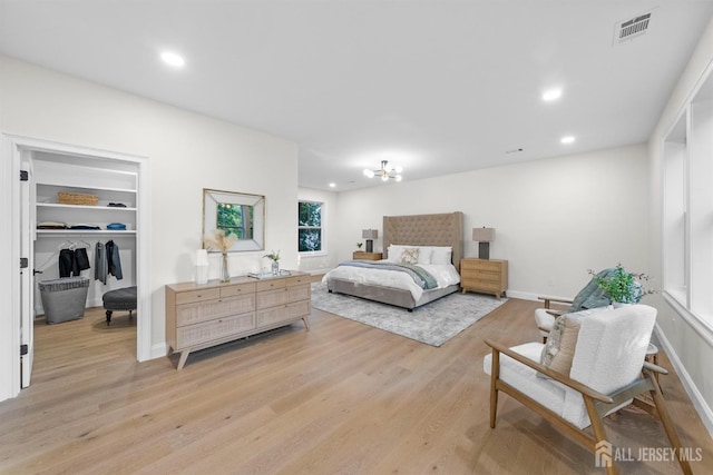 2 Beech Ln, Edison, NJ 08820 - bedroom featuring light wood-style flooring, a walk in closet, recessed lighting, baseboards, and a closet
