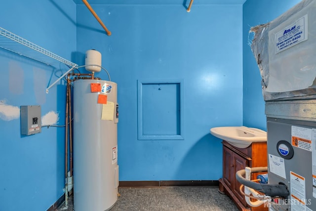 utility room featuring electric water heater