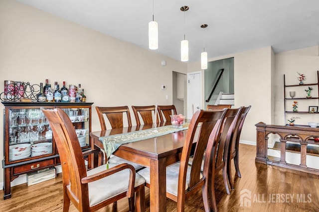 14 Academic Rd, East Brunswick, NJ 08816 - dining space with wood finished floors and stairs