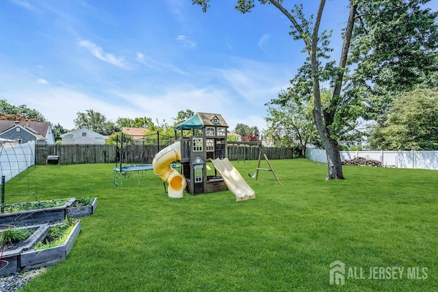 14 Academic Rd, East Brunswick, NJ 08816 - view of jungle gym with a trampoline, a fenced backyard, and a garden