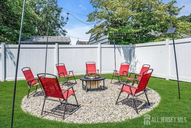 14 Academic Rd, East Brunswick, NJ 08816 - fenced backyard with a fire pit