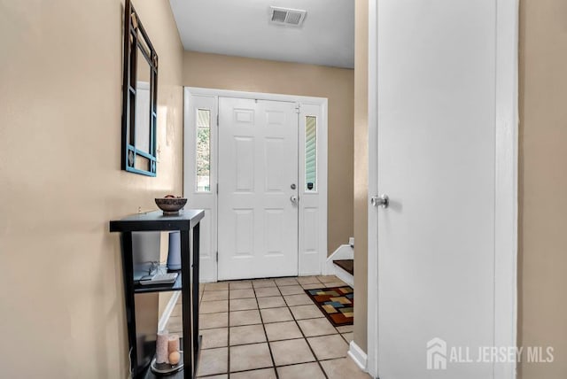 14 Academic Rd, East Brunswick, NJ 08816 - foyer featuring light tile patterned floors and baseboards