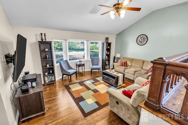 14 Academic Rd, East Brunswick, NJ 08816 - living area featuring vaulted ceiling, wood finished floors, and a ceiling fan