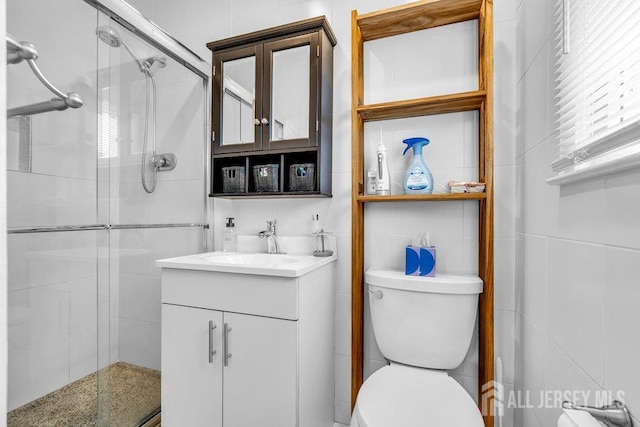 14 Academic Rd, East Brunswick, NJ 08816 - bathroom featuring vanity, a shower stall, and tile walls