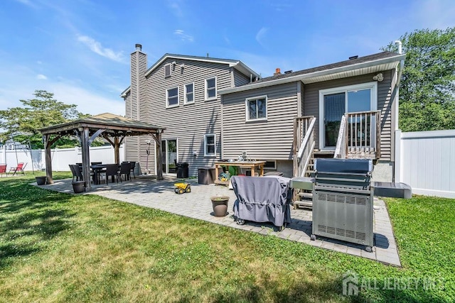 14 Academic Rd, East Brunswick, NJ 08816 - rear view of house featuring a gazebo, a chimney, and a patio