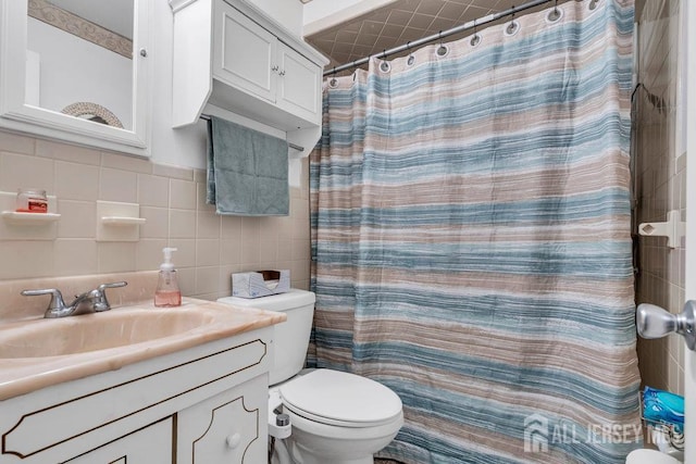 557 Howard Ave, Middlesex, NJ 08846 - full bath with vanity, a shower with curtain, and tile walls