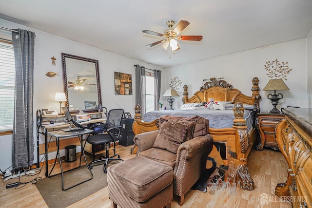 220 Raritan St, South Amboy, NJ 08879 - bedroom featuring multiple windows, an office area, wood finished floors, and ceiling fan