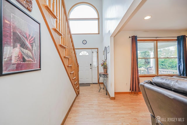 220 Raritan St, South Amboy, NJ 08879 - foyer entrance featuring stairs, light wood-type flooring, recessed lighting, and a high ceiling