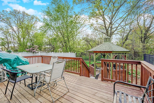 220 Raritan St, South Amboy, NJ 08879 - deck with a fenced backyard, outdoor dining area, and a gazebo