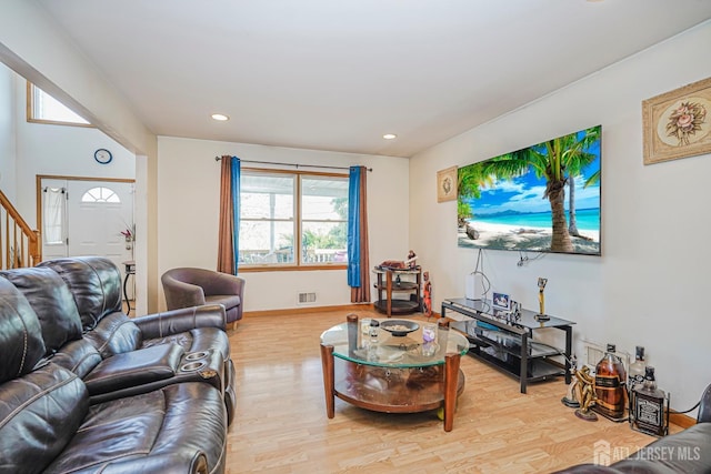220 Raritan St, South Amboy, NJ 08879 - living room featuring light wood finished floors, stairway, and recessed lighting