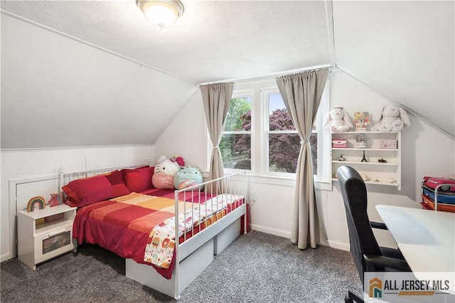 bedroom featuring vaulted ceiling and carpet floors