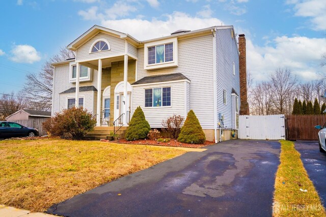 view of front of property with a front lawn