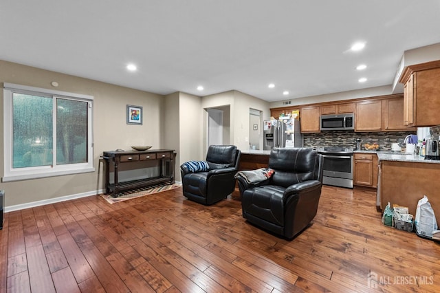 473 E Sayre Dr, Middlesex, NJ 08540 - living area with hardwood / wood-style floors and recessed lighting