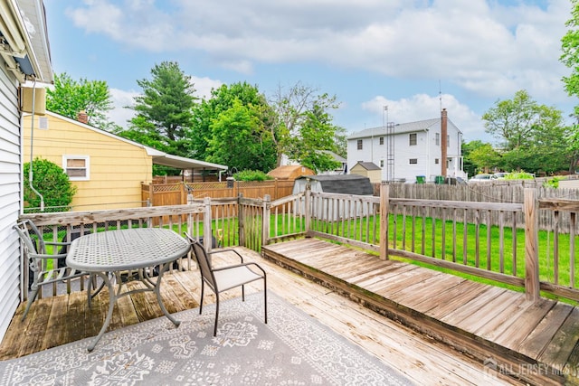 21 Suydam Ave, Edison, NJ 08817 - wooden deck with a shed, outdoor dining space, and a fenced backyard