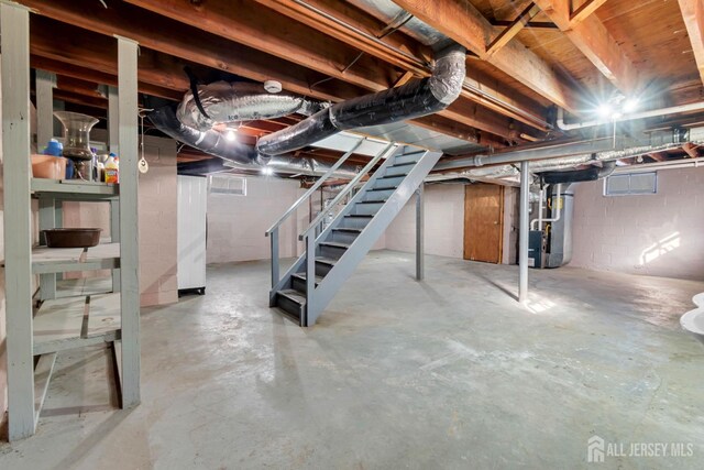 basement featuring heating unit