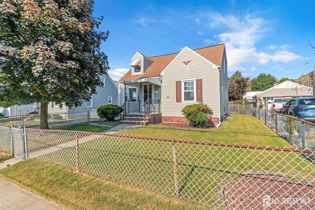 view of front of home with a front yard