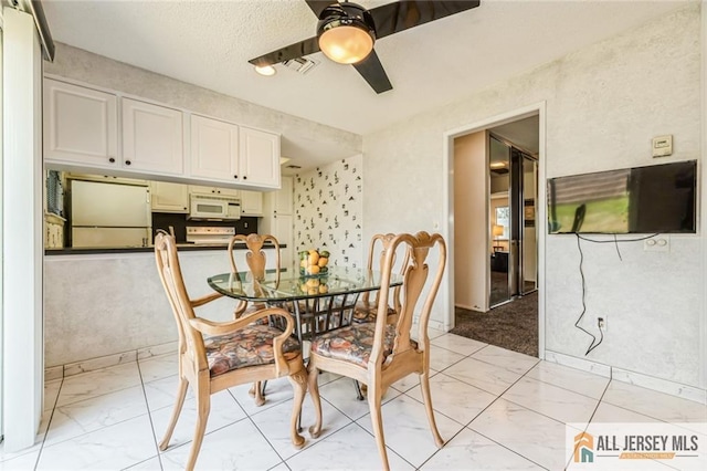 159 Pitman Rd Unit C, Monroe, NJ 08831 - dining space with visible vents, a ceiling fan, and marble finish floor