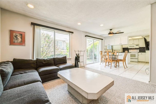 159 Pitman Rd Unit C, Monroe, NJ 08831 - living area featuring recessed lighting, a ceiling fan, marble finish floor, and a textured ceiling