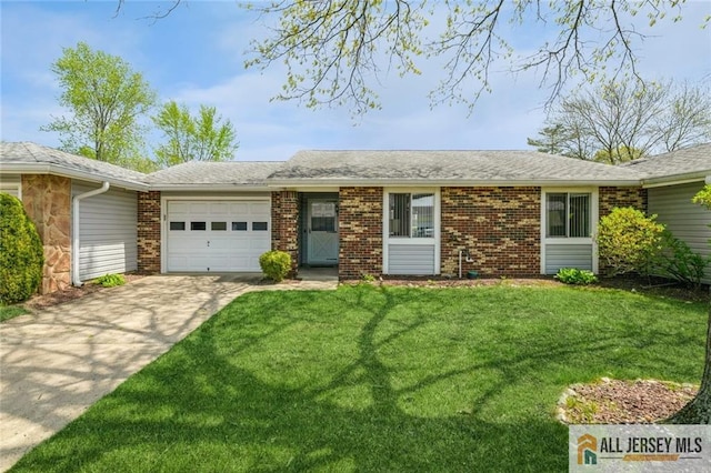 159 Pitman Rd Unit C, Monroe, NJ 08831 - single story home with brick siding, a front yard, driveway, and an attached garage