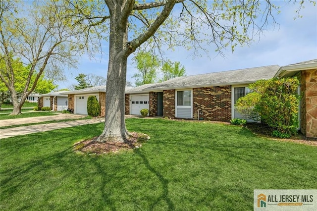 159 Pitman Rd Unit C, Monroe, NJ 08831 - ranch-style house featuring concrete driveway, a front yard, and an attached garage