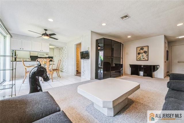 159 Pitman Rd Unit C, Monroe, NJ 08831 - living area with recessed lighting, light carpet, ceiling fan, visible vents, and a textured ceiling