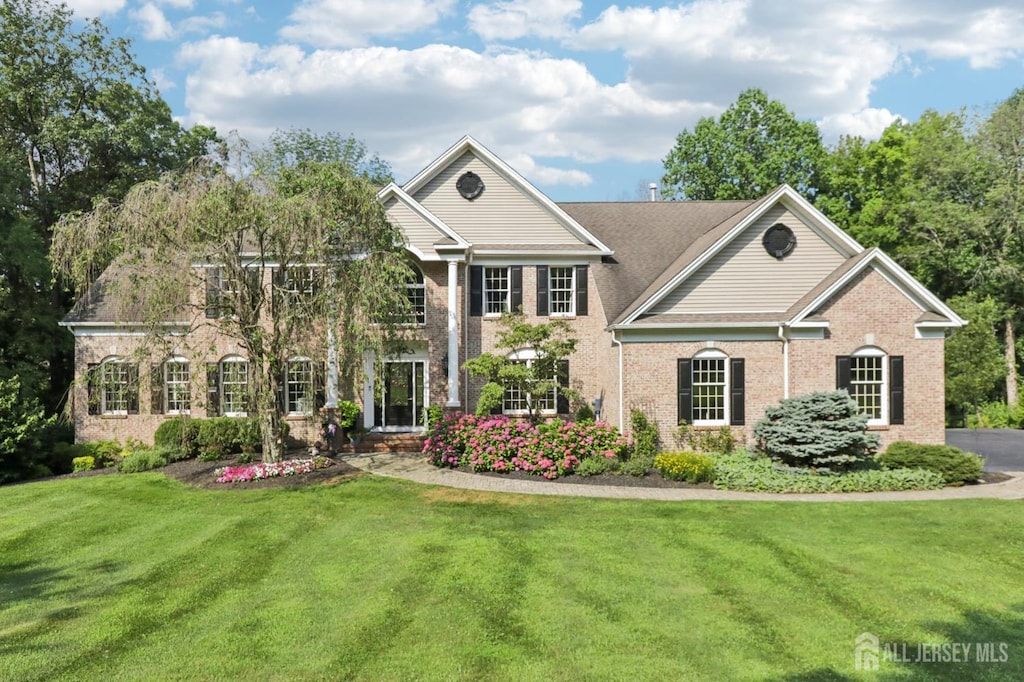 30 Cowie Rd, Chester Twp, NJ 07930 - view of front of house featuring a front lawn and brick siding