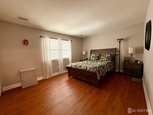 4 Nebraska Dr Unit C, Old Bridge, NJ 07747 - bedroom featuring dark wood finished floors and baseboards
