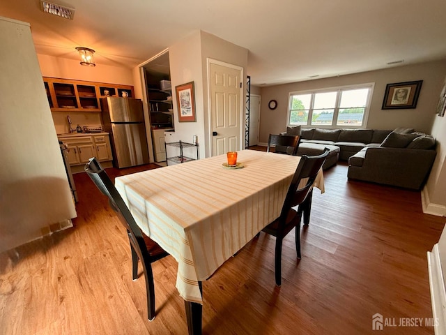 4 Nebraska Dr Unit C, Old Bridge, NJ 07747 - dining area with light wood-style flooring