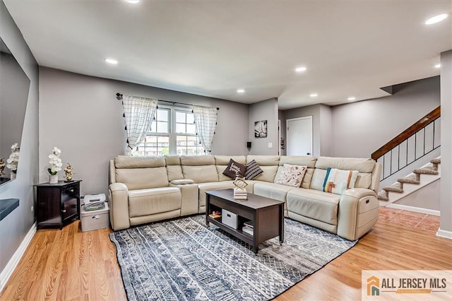 907 Maple Hill Dr Unit 907, Woodbridge Proper, NJ 07095 - living room featuring light wood-style floors, stairway, and recessed lighting