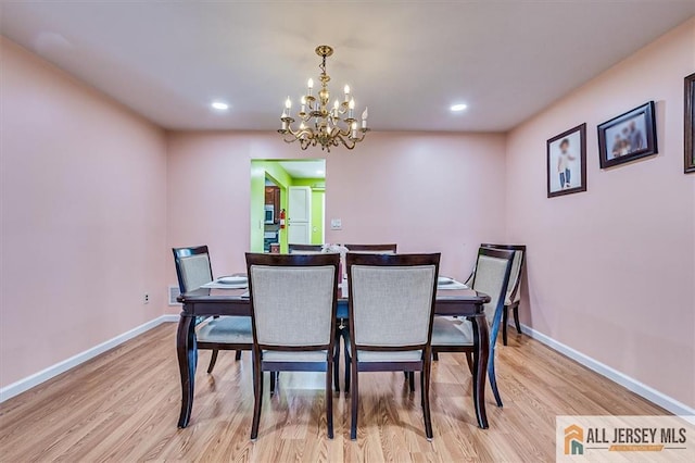 907 Maple Hill Dr Unit 907, Woodbridge Proper, NJ 07095 - dining area featuring light wood-style floors, a chandelier, and recessed lighting