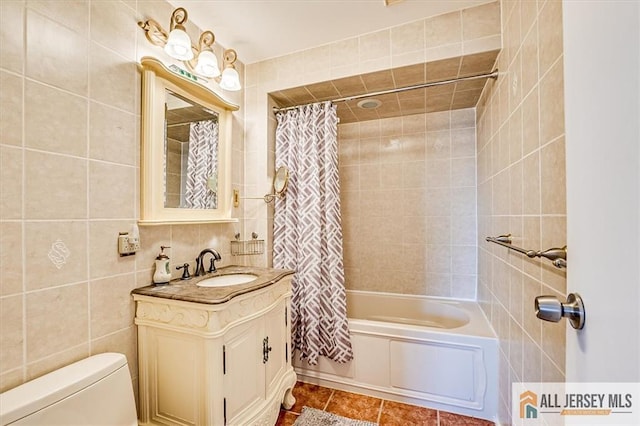 907 Maple Hill Dr Unit 907, Woodbridge Proper, NJ 07095 - full bathroom featuring vanity, tile walls, shower / bath combination with curtain, and tile patterned floors