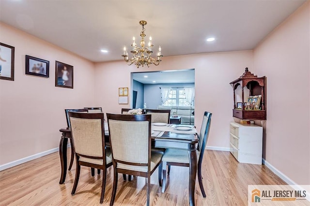 907 Maple Hill Dr Unit 907, Woodbridge Proper, NJ 07095 - dining space featuring a chandelier, light wood-style flooring, and recessed lighting