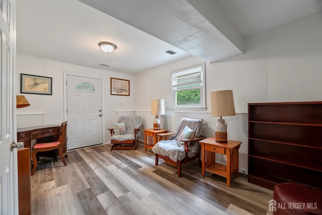 sitting room featuring hardwood / wood-style flooring